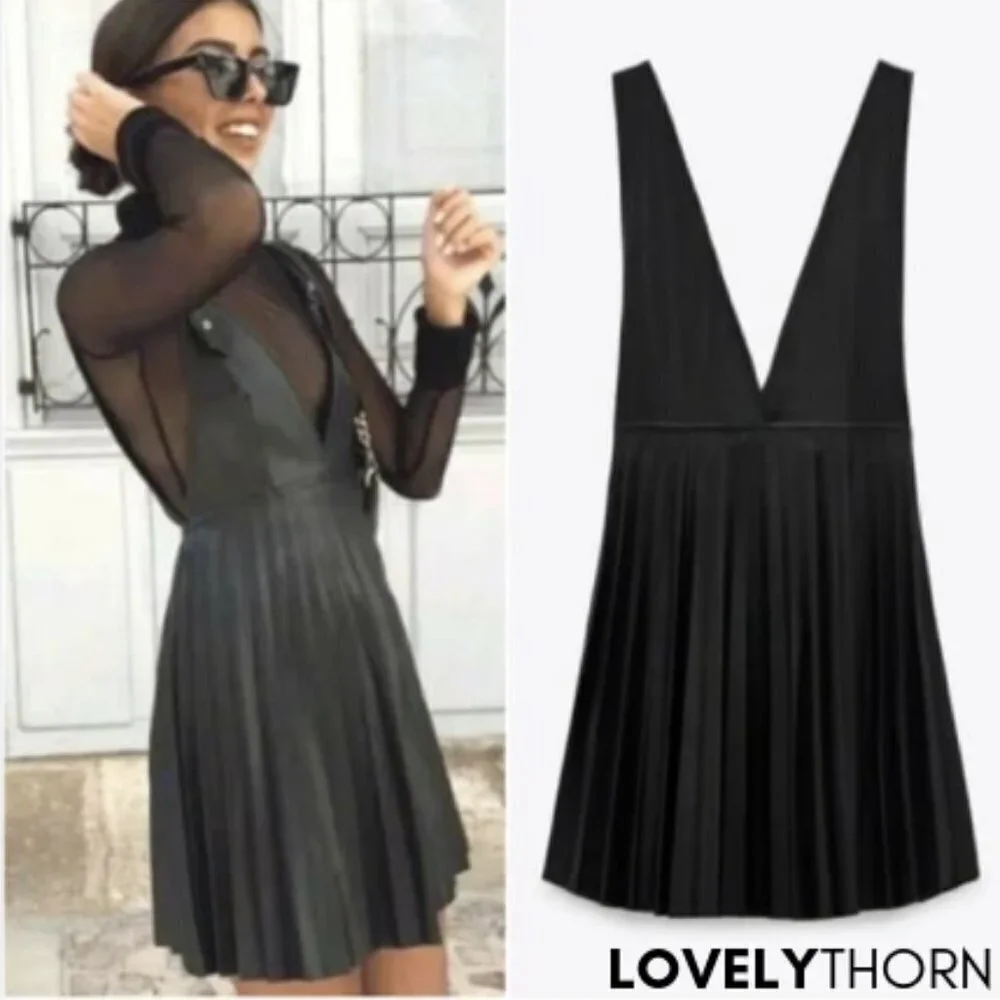 ZARA // ltd ed fashion blogger favorite pleated faux leather pinafore dress
